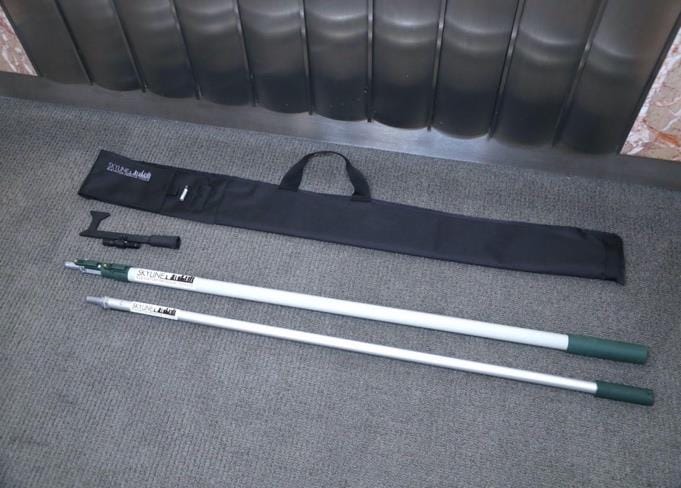 Skyline pole bag with extension pole, fixed pole, and hook
